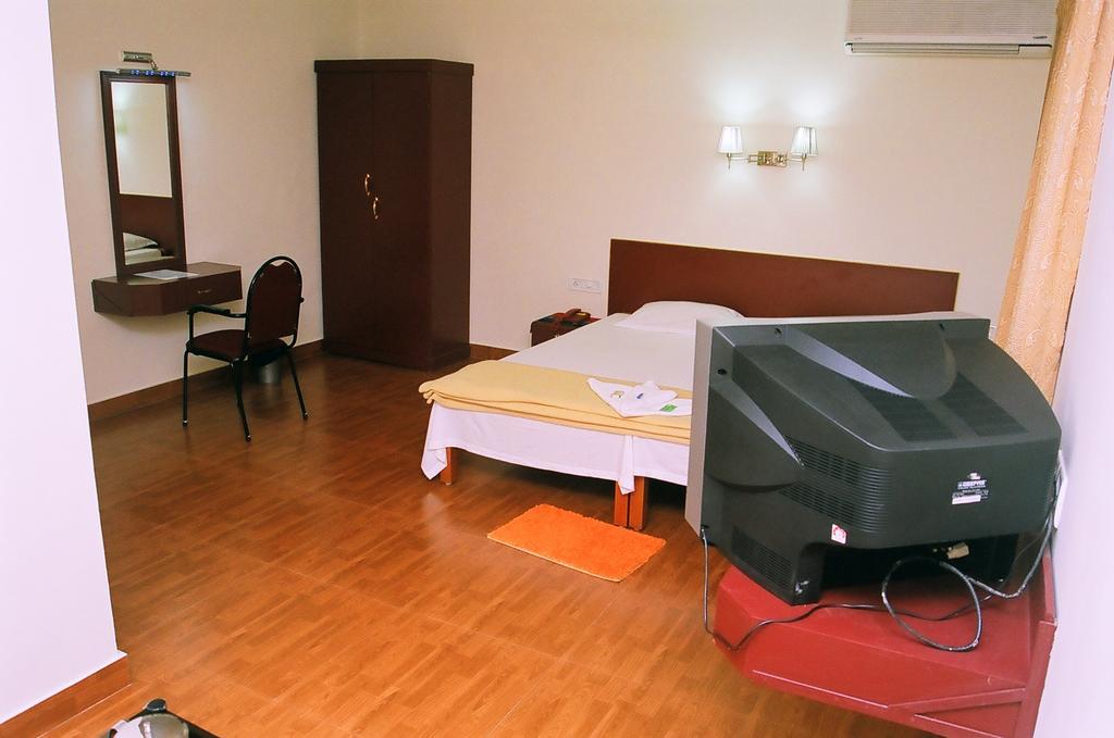 Hotel Srinivas Kochi Pokoj fotografie