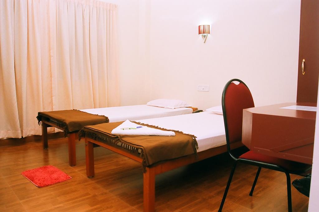 Hotel Srinivas Kochi Pokoj fotografie